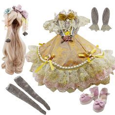 the doll is wearing a yellow dress and headband, shoes, and hair clips