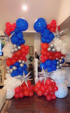 the balloon columns are decorated with stars and balloons