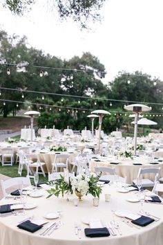 tables set up for an outdoor wedding reception