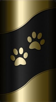 a black and gold background with paw prints