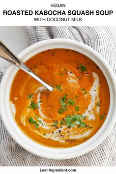 a bowl of roasted kabocha squash soup with coconut milk and parsley on top