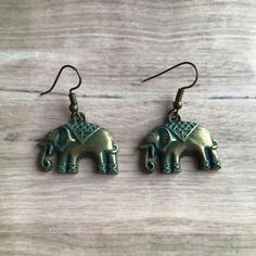 Elephant Earrings, Womens Jewellery, Animal Earrings, Bronze Elephant Charms, Handmade Jewellery,   Elephant Dangle Earrings Handmade Jewellery Antiqued Bronze Charm  100% New ~ Handmade  Bronze Ear wires with Bronze Charms  Measures 3 x 3.5 cm  Comes with Free Gift Bag Postage Includes Tracking  Shipped within 24 hours of purchase Womens Jewellery, Elephant Earrings, Animal Earrings, Elephant Charm, Jewellery Gift, Earrings Statement, Handmade Jewellery, Animal Lovers, Statement Jewelry