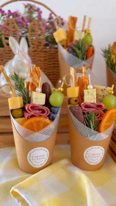 two baskets filled with food sitting on top of a table