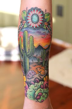 a person with a cactus tattoo on their arm