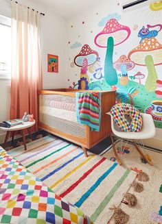 a child's bedroom decorated in bright colors