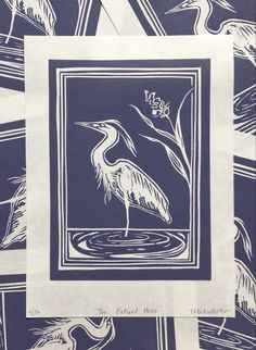 a blue and white print with a bird on it