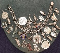 There are 2 portions to this lot. 1st is a sterling silver charm bracelet with what appear to be 2 charms from travelling and general life. They are:  Parliament Buildings, and Medicine Hat. There are also 27 loose charms included in this lot. They are #1 Grandma, sailboat, 2 candles,2 candles, LPN, British Columbia, boy, Bible, 1D?, crossed bowling pins, elephant, bells in a heart, Nova Scotia, diapers, Vancouver, #1 Dad, Saskatchewan Power Building, helicopter, Pisces, #1, praying hands, Pegas Luxury Vintage Metal Charm Bracelet, Sterling Silver Charm Bracelets, 2 Candles, Medicine Hat, Vintage Sterling Silver Charms, Bowling Pins, Praying Hands, Sterling Silver Charm Bracelet, Sterling Silver Charms