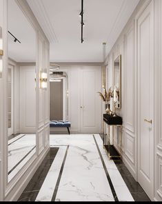 an elegant hallway with marble floors and white walls