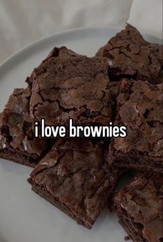 chocolate brownies on a plate with the words i love brownies