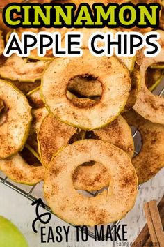 cinnamon apple chips on a cooling rack with apples in the background