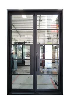 an open glass door in a warehouse