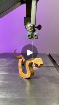 a video demonstrating how to use a sewing machine with the help of woodworking tools