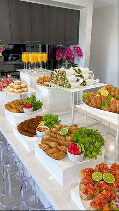 an assortment of food on display in a buffet