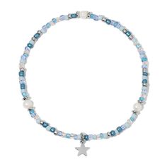 Complete your summer look with our Ocean Blue Seed Bead and Pearl Ankle Bracelet. Crafted with real freshwater pearls and ocean blue seed beads, adorned with a sterling silver plated star charm. Its strong-stretch construction ensures the perfect fit for anyone. Enhance your style with a touch of elegance and exclusivity. Blue Beaded Pearl Bracelet For The Beach, Blue Beaded Pearl Bracelet For Beach, Ocean-inspired Silver Beaded Bracelets, Silver Beaded Ocean-inspired Bracelets, Blue Beaded Ocean-inspired Anklet, Pearl Ankle Bracelet, Ankle Bracelet, Summer Look, Ocean Blue