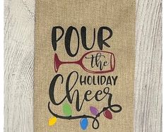 a door hanger with the words pour the holiday cheese on it