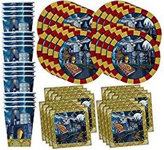 the wizard's castle party supplies kit includes plates, napkins and cups with decorations