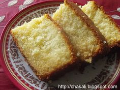 two pieces of cake on a plate with red table cloth and white doily around it