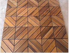 the floor is made out of wood and has many different patterns on it's surface