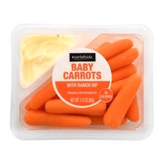 baby carrots with ranch dip in a plastic container