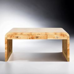 a wooden table with two drawers on it