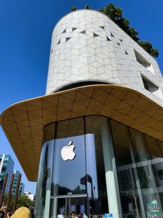 an apple store in the middle of a city