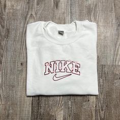 We Have All Sizes White! The Sizing Is Unisex / Mens. These Are Made To Order But We Usually Have Them Shipped In 2-3 Days :) Nike Sweatshirt Custom, White Embroidered Graphics T-shirt For College, White Embroidered Logo Top For College, White Letter Embroidery T-shirt For Streetwear, White Long Sleeve T-shirt With Embroidered Logo, Casual Streetwear Tops With Machine Embroidery, Casual Tops With Machine Embroidery For Streetwear, Casual Machine Embroidered Tops For Streetwear, Sporty White T-shirt With Embroidered Text