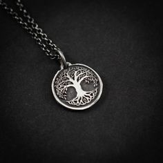 Sterling silver 925 Oxidized Tree o life Yggdrasil necklace. The silver necklace was oxidized to create a more antique rustic look. The Yggdrasil necklace, inspired by Norse mythology, showcases the World Tree's intricate design. It symbolizes the interconnectedness of life and the rich heritage of the Vikings, making it a profound and stylish accessory. DETAILS:  * Material: 925 Sterling Silver * Dimensions: 0.8 x 0.8 Inch  ~PERSONALIZATION~ I also offer the option to engrave a personal message Mythology Jewelry, Rustic Necklace, Jewelry Men, Jewelry Personalized, Necklace Unique, Norse Mythology, Stylish Accessories, Tree Of Life, Vikings