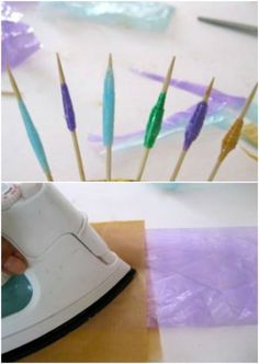 there are several different types of toothbrushes on the table and in front of an ironing board