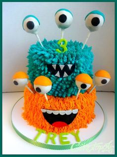 an image of a cake with monster eyes on it