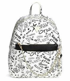 NEW GUESS Lucianna Black White Logo Graffiti Print Chain Backpack Handbag Zipper closure 12" shoulder drop Perfect for days on the go, this faux-leather backpack features a removable logo pouch, top zipper closure and front slip pocket. Front triangle logo plaque and interior pockets. Adjustable backpack straps with 21" drop. Top handle with 5" drop. Dimensions: 10.5"W x 12"H x 4"D Shipping: We ship world wide. Item will be shipped within 24 hours as soon as your payment is verified. Please chec Trendy Travel Backpack With Chain Strap, Trendy Logo Backpack Bag, Trendy Logo Backpack, Black White Logo, Backpack Handbag, Faux Leather Backpack, Graffiti Prints, Drop Top, Triangle Logo