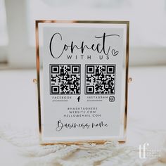 a close up of a business card with qr code on it and the words connect with us