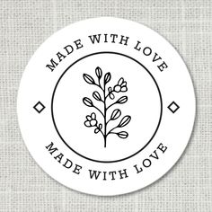 the made with love sticker is shown in black and white on a linen background