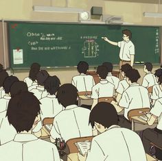 a classroom full of students in front of a chalkboard