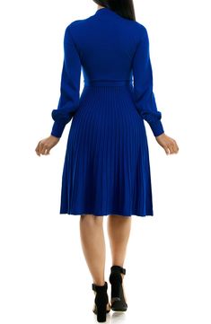 A tonal sash accentuates your figure in a long-sleeve sweater dress with a flattering fit-and-flare profile. 41 1/2" length Mock neck
 Long sleeves 78% rayon, 22% polyester Machine wash, tumble dry Imported Model stats: 5'10" height, 32" bust, 25" waist, 36" hip. Non-stretch Long Sleeve Sweater Dress, Solid Pleated Midi Dress For Winter, Winter Long Sleeve Solid Color Midi Dress, Winter Solid Color Long Sleeve Midi Dress, Knee-length Long Sleeve Dress For Fall, Fitted Long Sleeve Belted Dress, Fall Knee-length Long Sleeve Solid Dress, Fall Knee-length Solid Color Long Sleeve Dress, Ribbed A-line Midi Dress For Fall