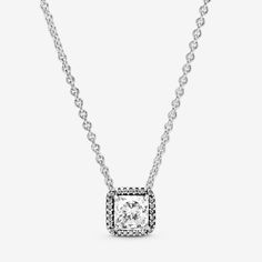 Elegance never goes out of style and this timeless collier necklace in sterling silver will serve you as a staple in your collection for years to come. The necklace set with a square clear cubic zirconia for a full-on sparkle effect The chain necklace is adjustable to three different lengths, so that you can create the perfect styling to match your look. Wear it alone for evening events or to add statement sparkle to daytime looks. - Pandora Square Sparkle Halo Necklace - Sterling silver / Cubic Zirconia / Clear - Sz. 17.7 in Classic Silver Square Pendant Jewelry, Timeless Silver Necklace With Sparkling Stones, Timeless Silver Necklace With Diamond Cut, Classic Silver Necklace With Diamond Accents, Classic Pendant Necklace With Sparkling Stones, Timeless Silver Diamond-cut Necklace, Classic Sterling Silver Solitaire Necklace With Square Pendant, Classic Sterling Silver Necklace With Sparkling Stones, Classic Silver Solitaire Necklace With Sparkling Stones