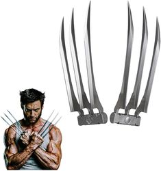 the wolverine movie character is holding his claws