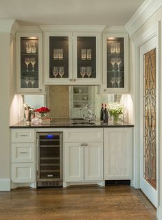 the kitchen is clean and ready to be used for wine tasting or as an appliance