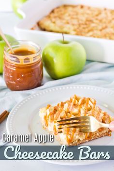 an apple pie is on a white plate with a fork in it and some apples next to it