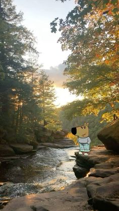 a cartoon character is standing in the middle of a river with rocks and trees around it