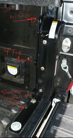 the inside of a vehicle with various parts labeled in red and black writing on it