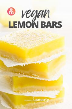 three lemon bars stacked on top of each other with the title vegan lemon bars