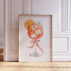 an art print with a glass of wine and orange slices