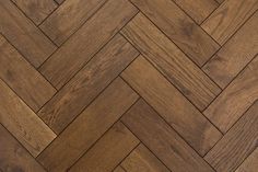 an image of wood flooring that looks like it is made out of herringbones