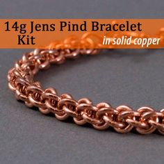 a rose gold chain bracelet on a gray background with the words, rain studios @ any c sanders