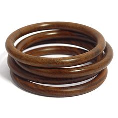 PRICES MAY VARY. 【💎 DESIGN】: Chatter Collection is a set of 4 handmade colorful bangles wherein a full round profile saffron teak wooden bangle bracelet is flanked on each side by full round profile sissoo wood bangles which are known for their dark brown colors and beautiful natural grains. Honey bee wax polished for a satin-smooth finish. 【📏 BANGLE BRACELET SIZE】: Width of Set: 1.18 Inches (3 cm), Inner diameter: 2.6 inches (66 mm) which fit medium & large wrists, and Combined-Weight: 27 gms Handmade Brown Round Bangle, Wood Bangles, Chunky Bangles, Wooden Bangles, Wooden Bangle Bracelet, Bee Wax, Round Profile, Colorful Bangles, Wooden Bangle