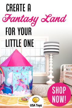 a pink tent sitting on top of a wooden table next to a lamp and window