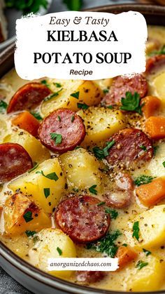 a close up of a bowl of food with potatoes and sausage