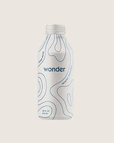 a bottle of wonder water on a white background with the word wonder written in blue