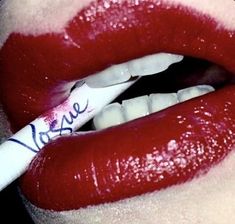 a close up of a woman's lips with the word vose written on it