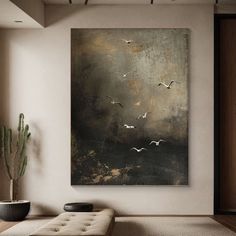 a painting hanging on the wall in a living room